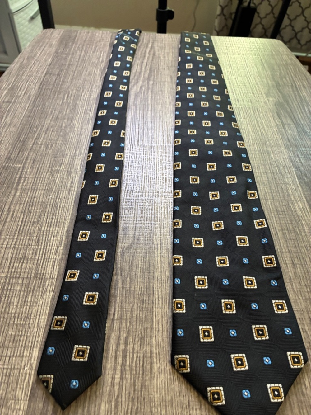 Jos. A. Bank Black Silk Tie with Blue and Gold Geometric Motif